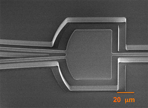 Monolithically, widely tunable quantum cascade lasers based on a heterogeneous active region design